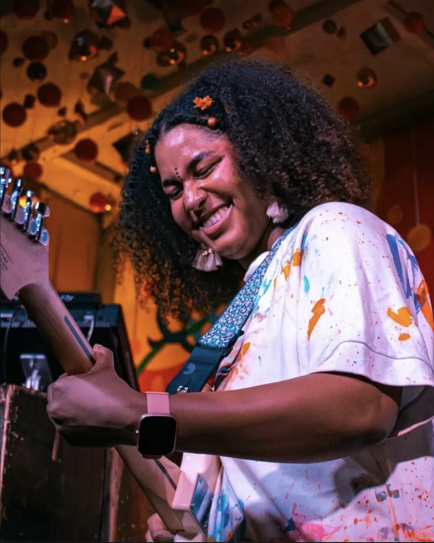 A guitarist performing on The Gallimaufry stage