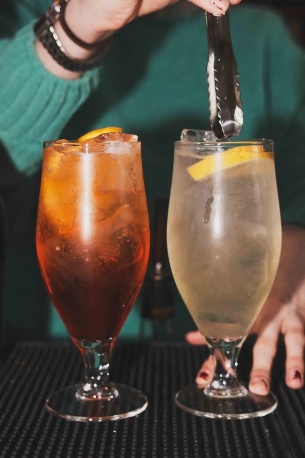 Two cocktails being finished behind The Gallimaufry bar