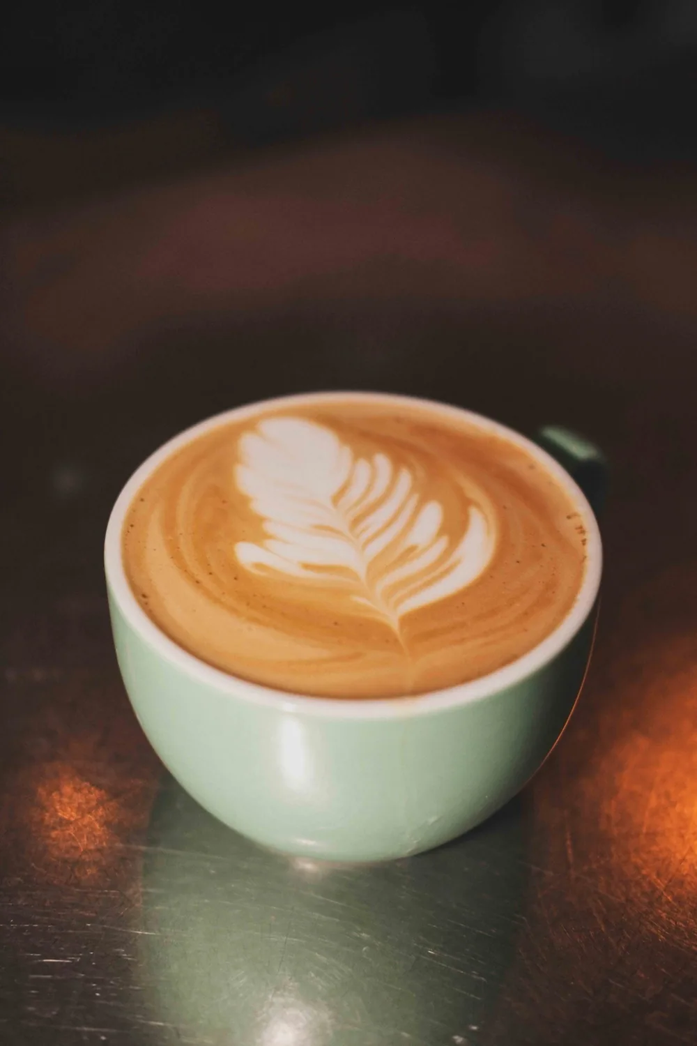A finished flat white on The Gallimaufry bar