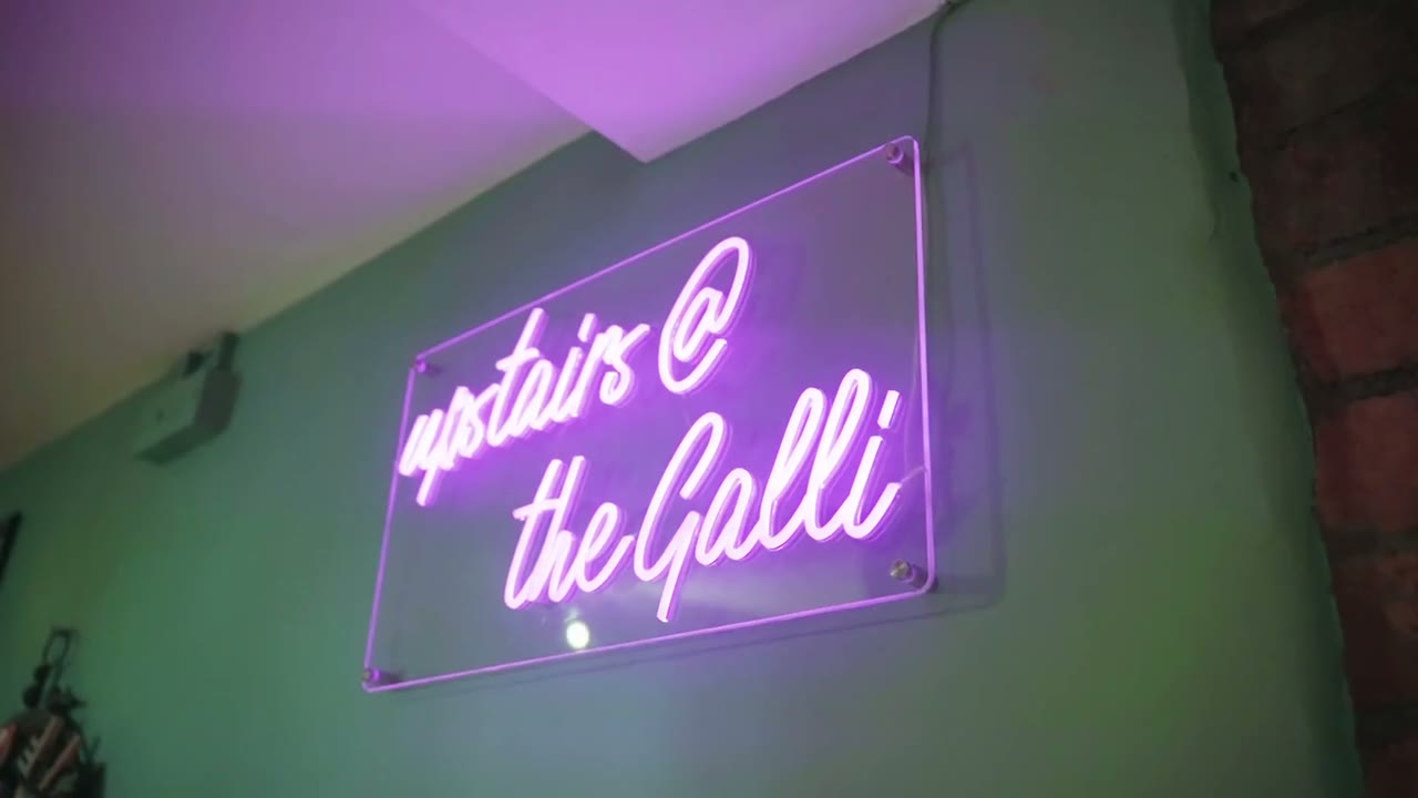 Neon Upstairs at the Galli sign in the function room